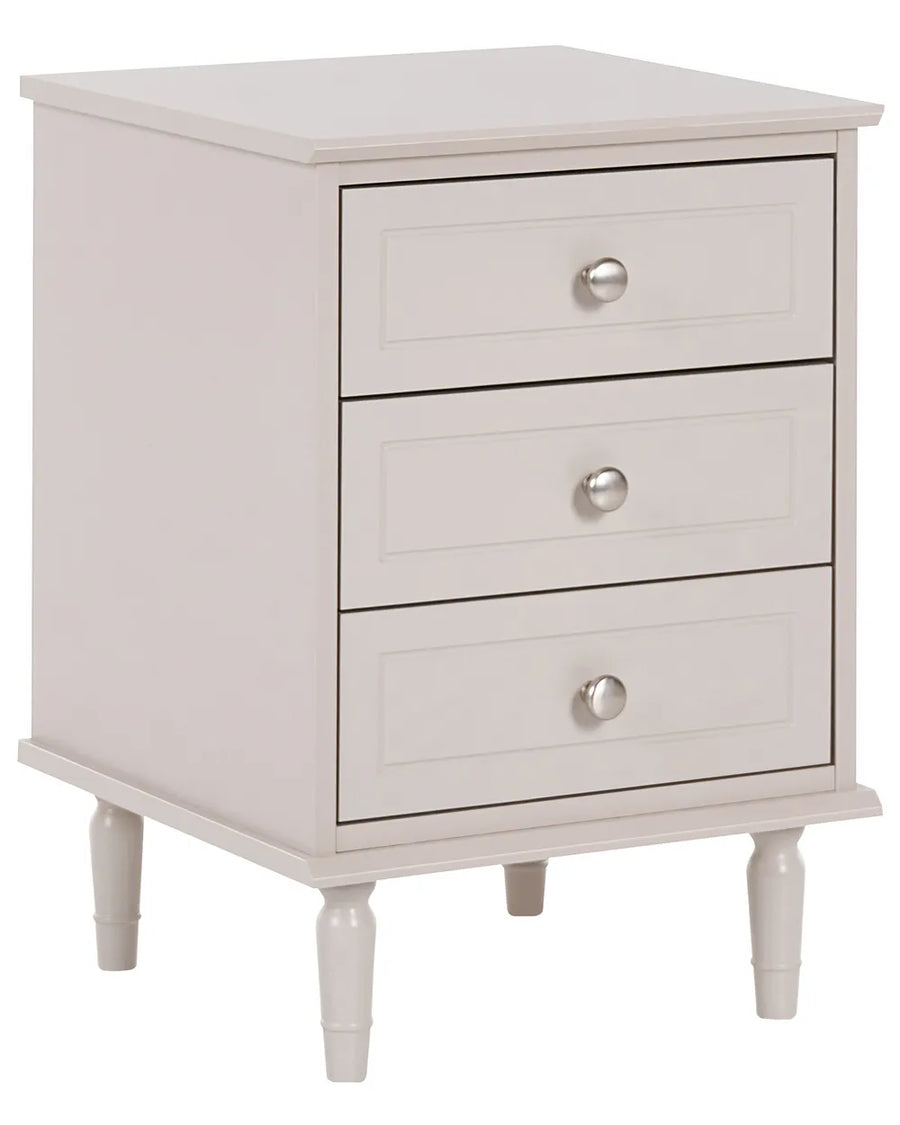 A three-drawer nightstand with a light beige finish and silver round knobs, shown on a plain white background.