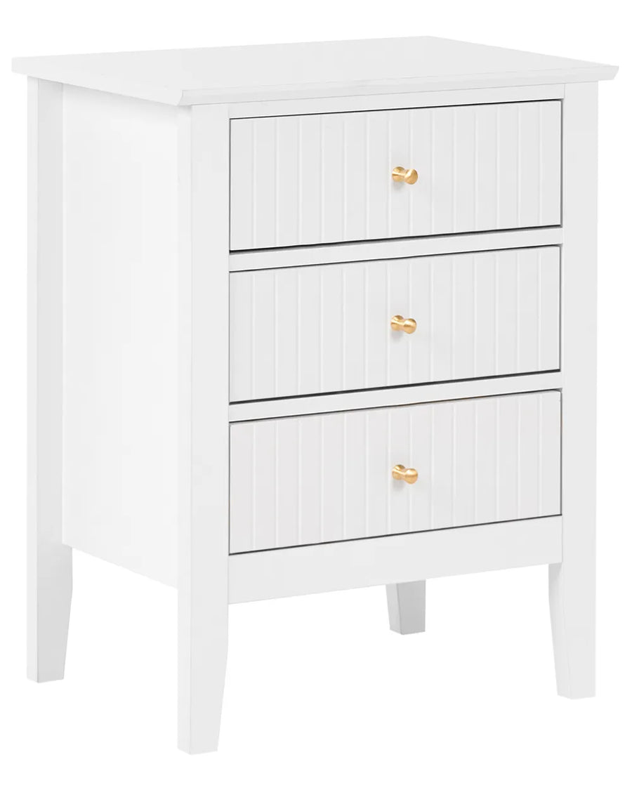 A white three-drawer nightstand with vertical panel doors and small round gold knobs, shown on a plain white background.
