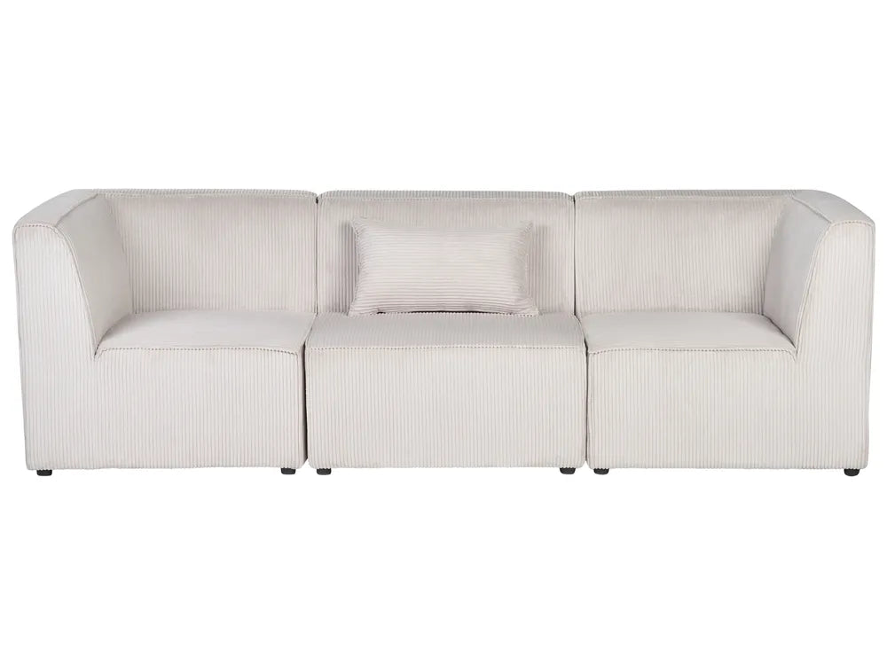 A modern three-seat modular sofa upholstered in a textured, ribbed cream fabric, featuring a matching throw pillow, set against a plain white background.