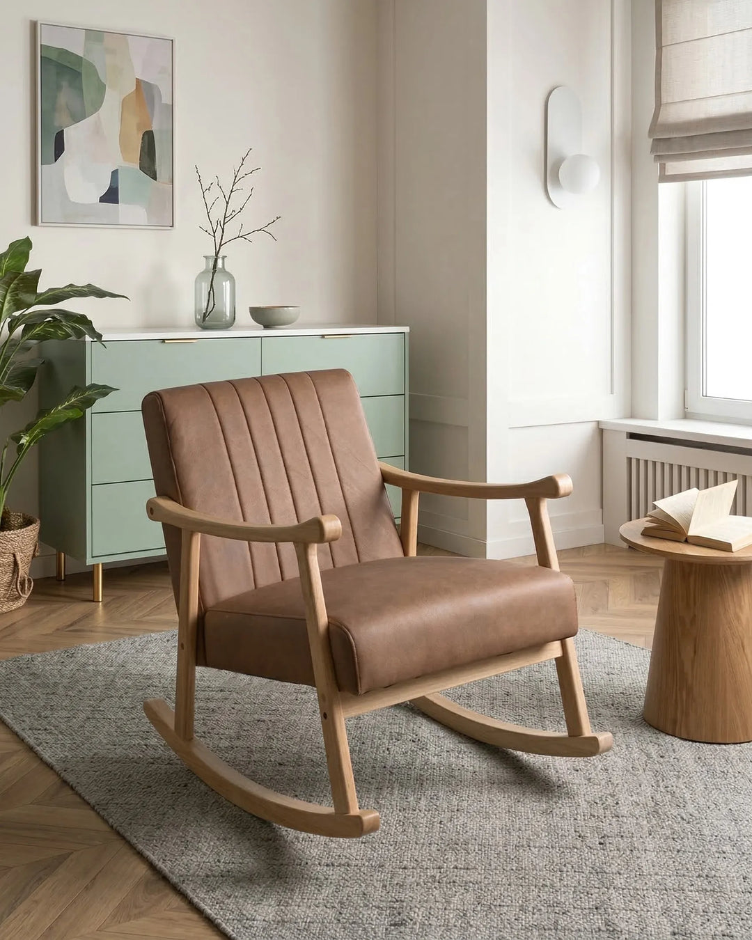 Brown rocking chair in a modern living room with a neutral color palette.