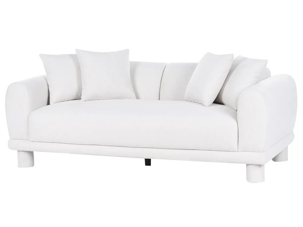 A modern white upholstered sofa with rounded arms, a low profile, and four matching throw pillows, shown against a plain white background.