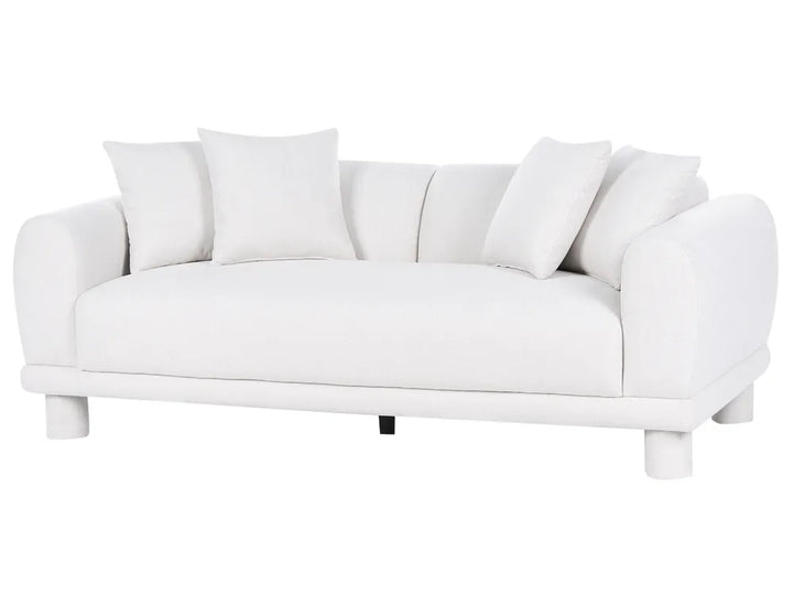 A modern white upholstered sofa with rounded arms, a low profile, and four matching throw pillows, shown against a plain white background.
