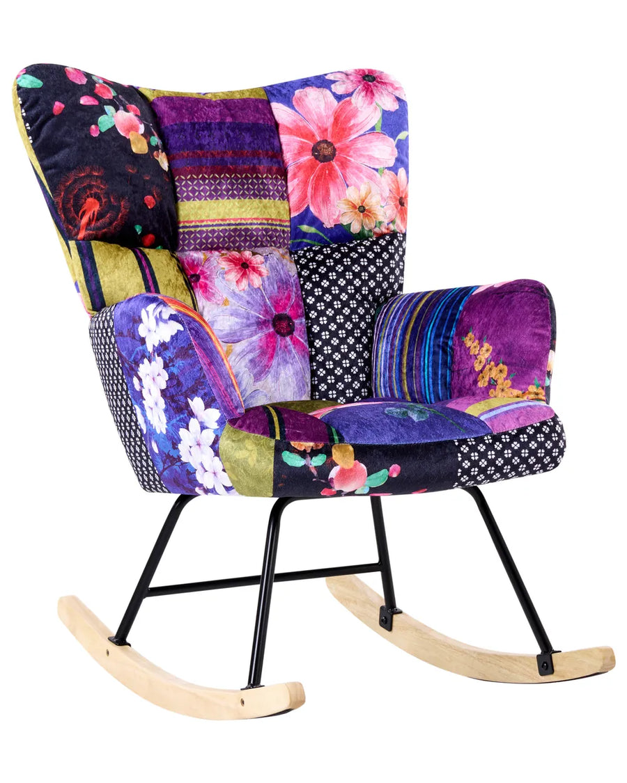 Colorful patchwork rocking chair with floral patterns on a white background