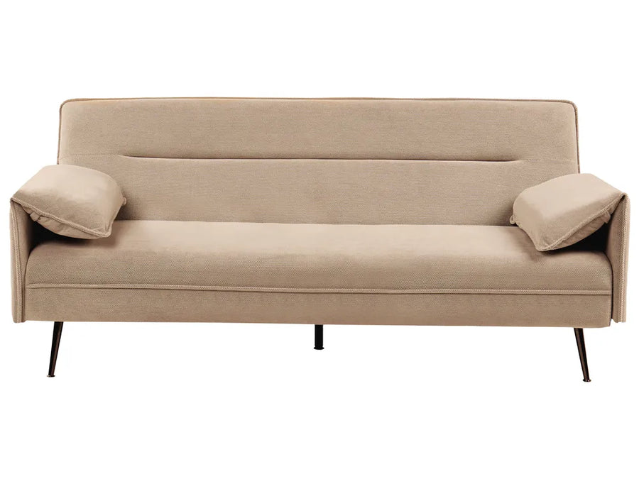 A modern beige fabric sofa bed with two matching throw pillows and slim black metal legs, shown against a plain white background.