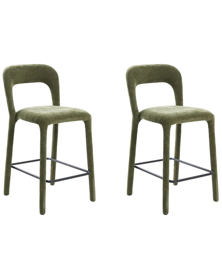 Two modern bar stools with olive green upholstered seats and curved backs, featuring slim black metal legs and footrests, shown on a plain white background.