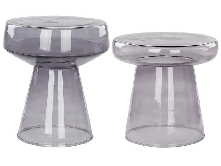 Two transparent gray side tables on a white background