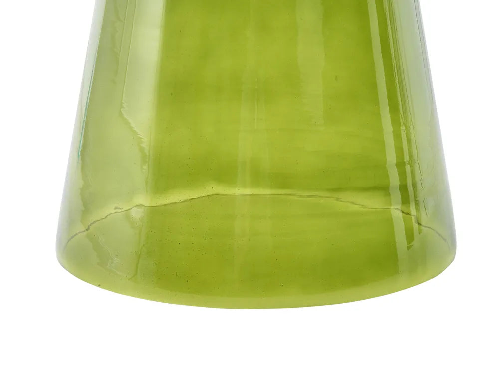 Close-up of the bottom half of a translucent olive green glass vase or decorative container on a white background.