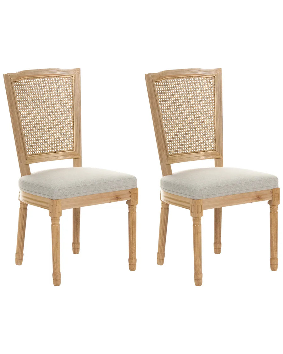Two matching wooden dining chairs with woven cane backrests and light gray upholstered seats, shown on a plain white background.