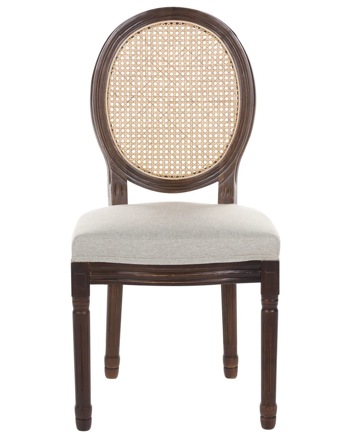An elegant dining chair featuring a dark brown wooden frame, a round cane backrest, and a light beige upholstered seat cushion, shown against a plain white background.