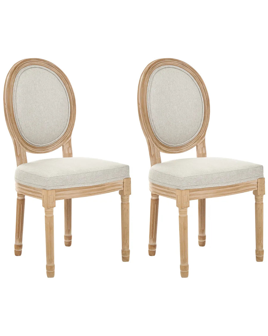 Two matching dining chairs with oval upholstered backs and light natural wood frames, shown on a plain white background.
