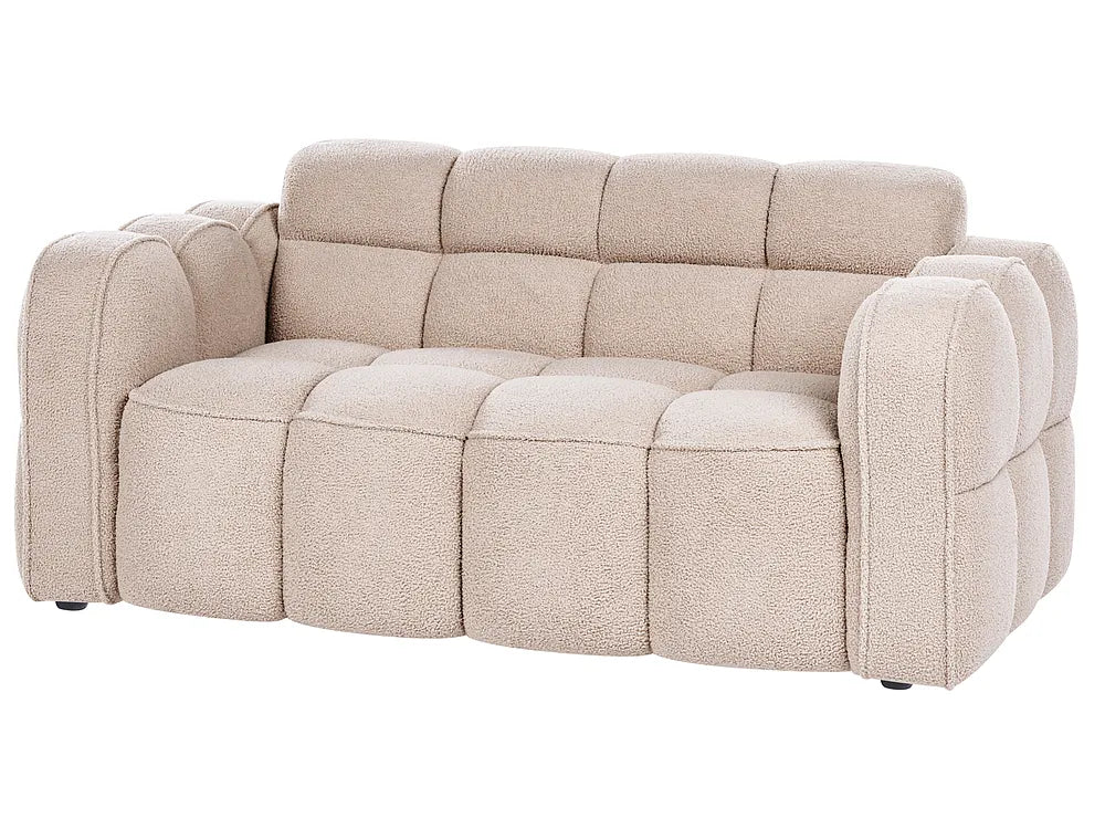 A modern tufted loveseat sofa upholstered in a textured beige bouclé fabric, shown from a three-quarter angle against a plain white background.