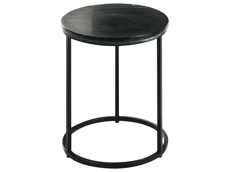 Black round side table on a white background