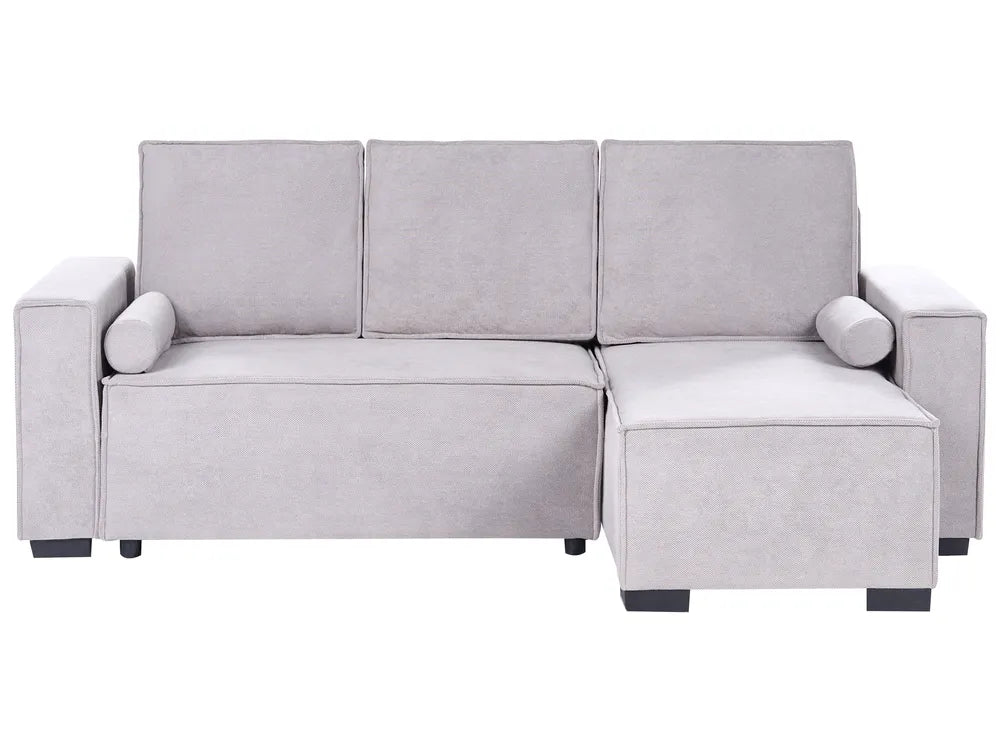 Gray sectional sofa in a living room.