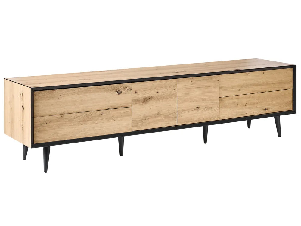 A modern long sideboard or TV console with a light natural oak wood finish and black metal legs and trim, shown on a plain white background.