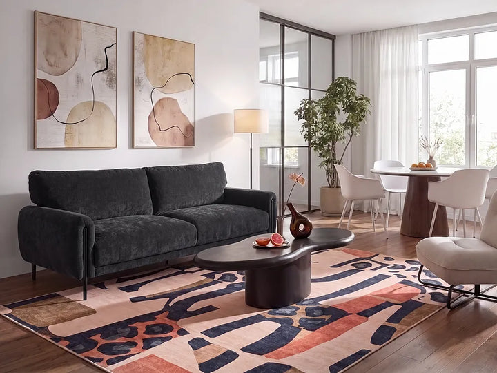 Three-seater black lounge sofa