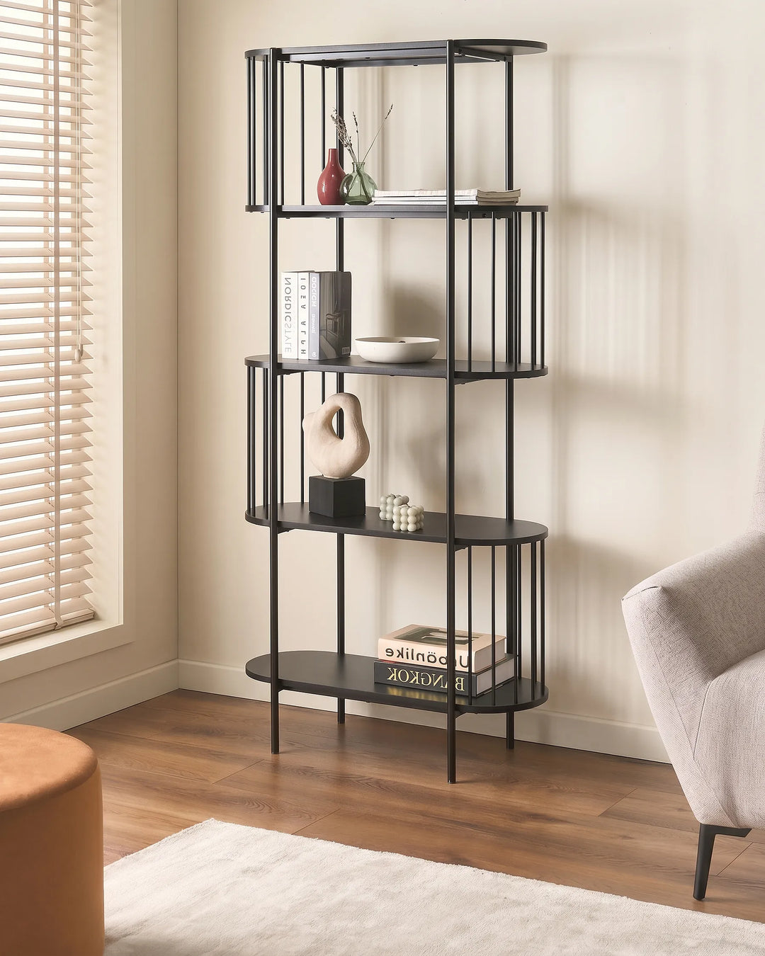 A modern 5-tier bookcase with a black metal frame and dark gray shelves