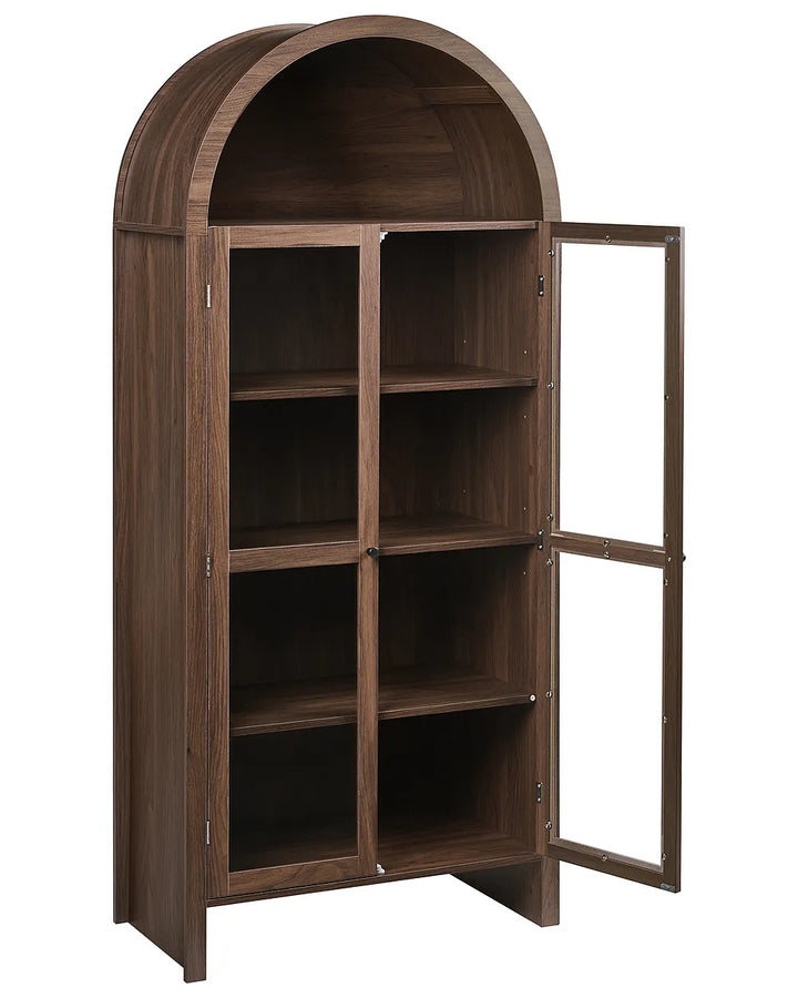 A tall arched wooden bookcase cabinet with a dark brown finish, featuring two glass-paneled doors on the front and open shelving inside, shown with one door open against a white background.