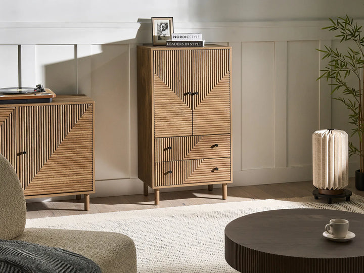 Wooden cabinet with geometric design in a living room setting
