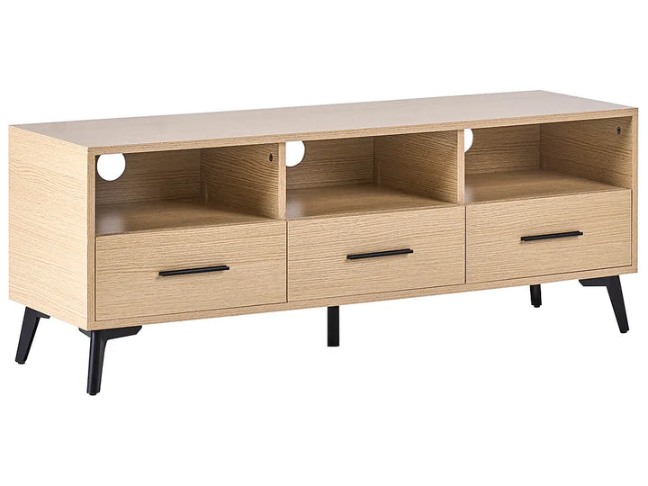 A modern light oak wood TV stand or media console with three open shelves, three drawers with black handles, and tapered black legs, shown on a plain white background.
