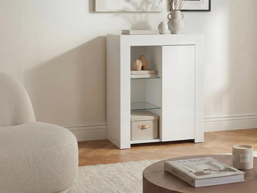 White cabinet in a living room with a neutral color scheme
