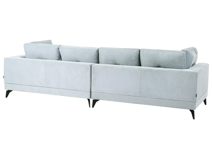 A modern light gray fabric sectional sofa with segmented back cushions and tapered black legs, shown against a plain white background.
