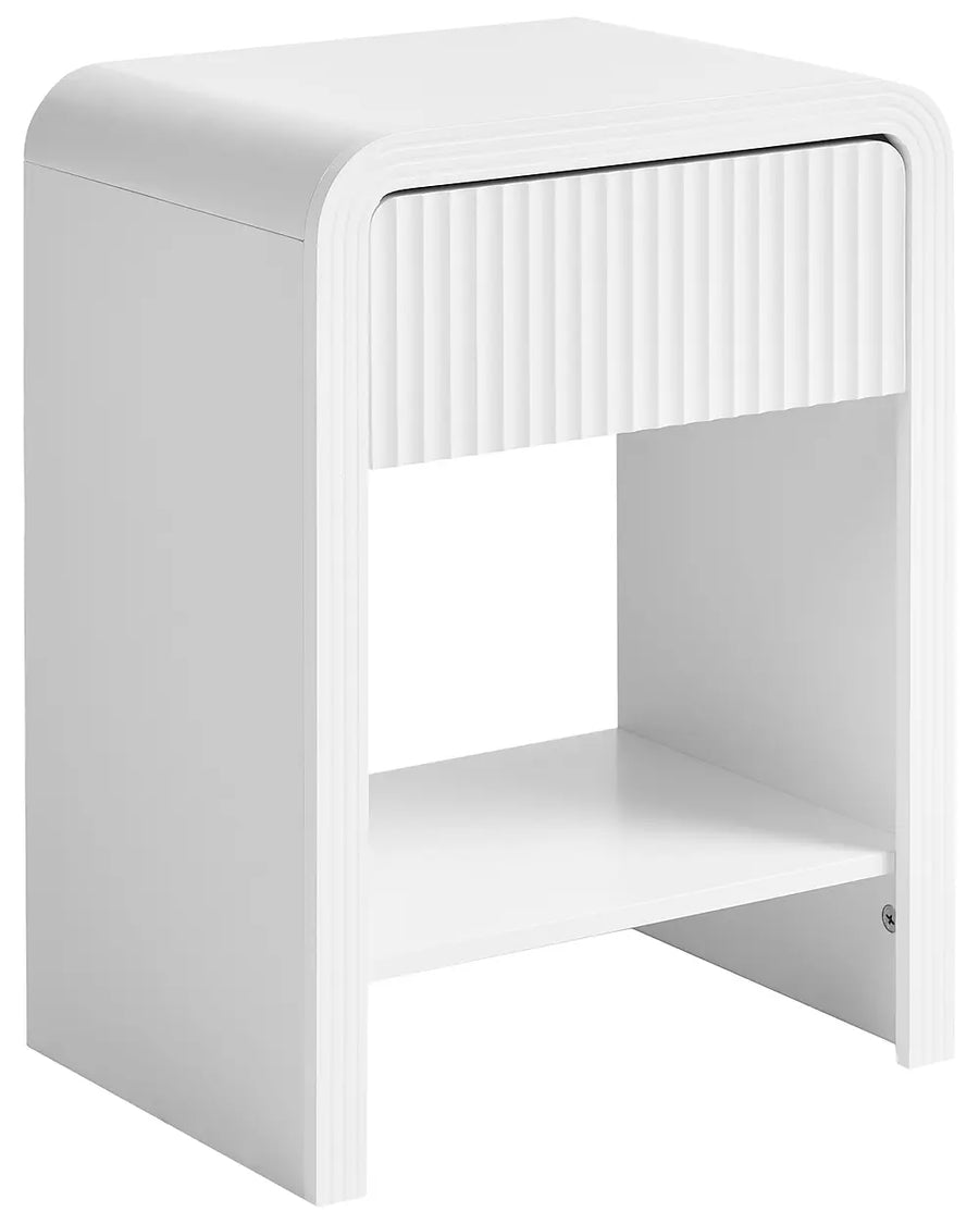 A modern white bedside table or nightstand with a single ribbed-front drawer and an open lower shelf, shown on a plain white background.