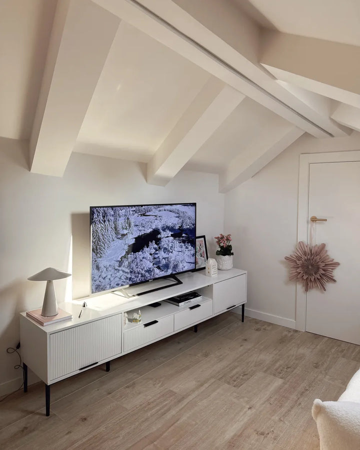 White TV stand with open shelving