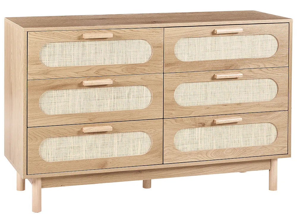 A light oak wood six-drawer dresser with woven cane inserts in the center of each drawer front and light wood handles, shown on a plain white background.