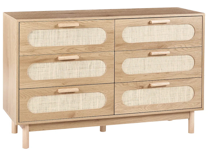 A light oak wood six-drawer dresser with woven cane inserts in the center of each drawer front and light wood handles, shown on a plain white background.