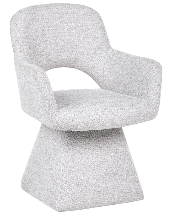 A modern upholstered accent chair with a light gray textured fabric, featuring a curved backrest, integrated armrests, and a sculptural pedestal base, shown against a plain white background.