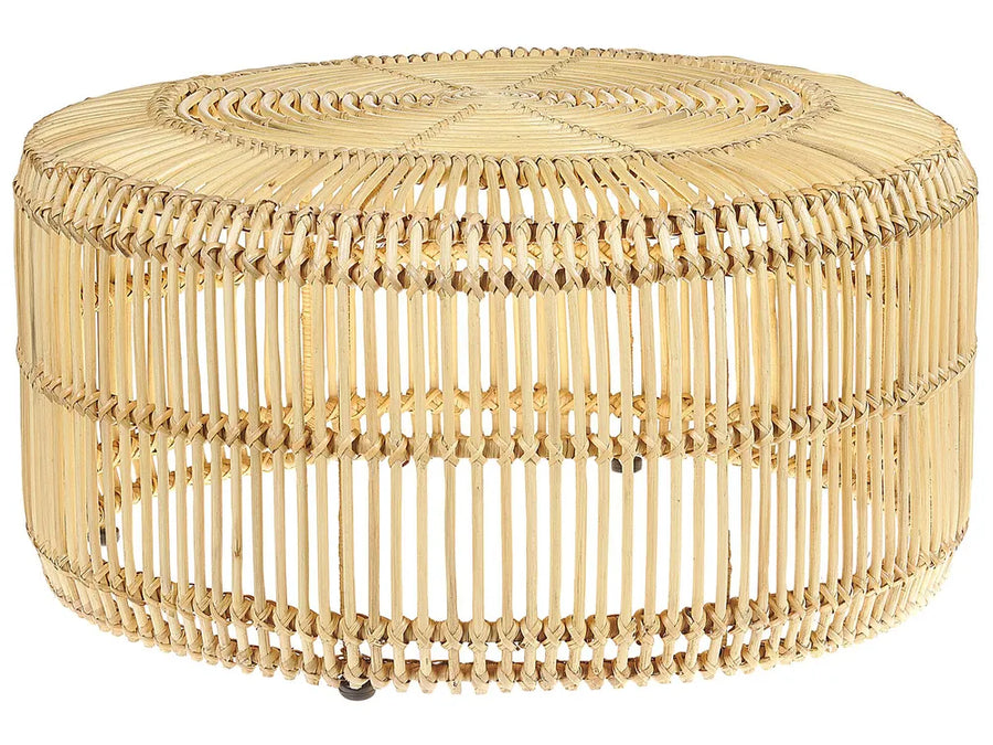 Woven rattan ottoman on a white background