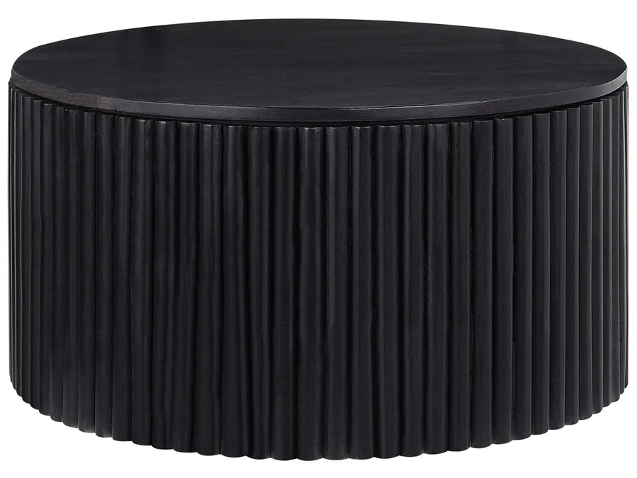 Round black coffee table with ribbed surface design on a white background