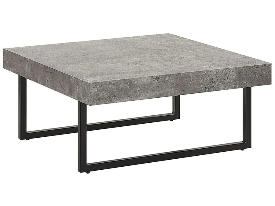Square concrete coffee table with black metal legs on a white background