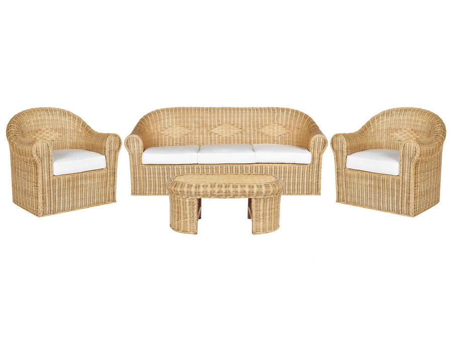 A Boho-inspired garden sofa set made of natural rattan, including a 3-seater sofa, two armchairs, and a coffee table, all equipped with white cushion covers.