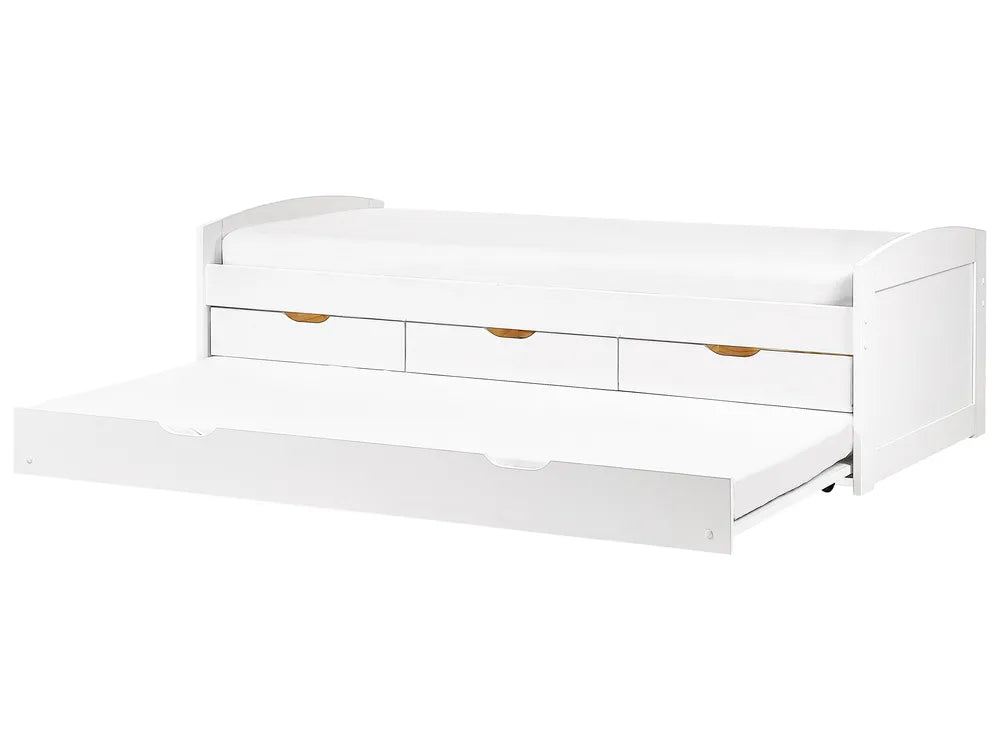 White bed with storage drawers on a white background