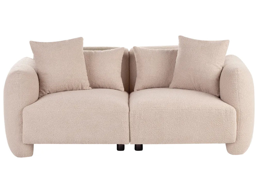 A modern two-seater sofa in a textured bouclé fabric, upholstered in a light beige color, featuring four matching throw pillows and small black legs, shown against a plain white background.