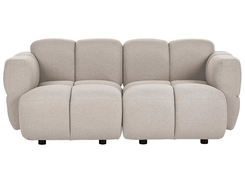 A modern modular upholstered sofa with rounded blocky cushions and wide armrests, shown from the front on a plain white background.