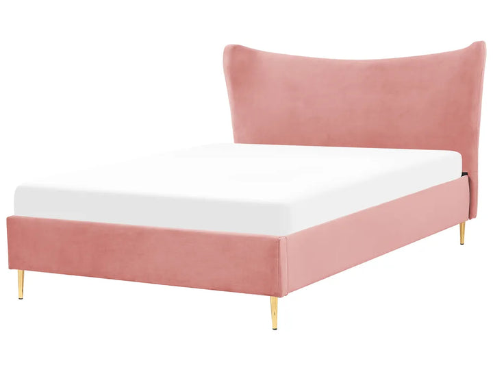 Pink upholstered bed with white mattress on a white background