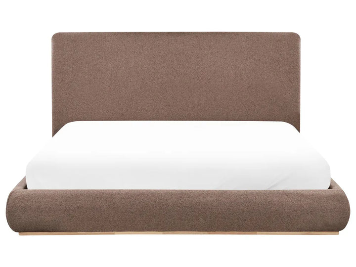 Brown upholstered bed with white mattress on a white background