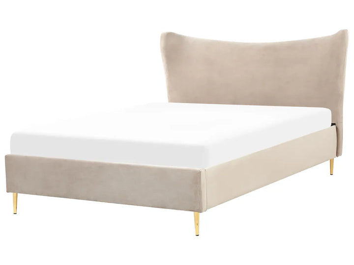 Beige upholstered bed with white mattress on a white background
