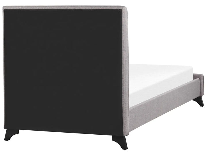 Minimalist fabric bed with button-tufted headboard