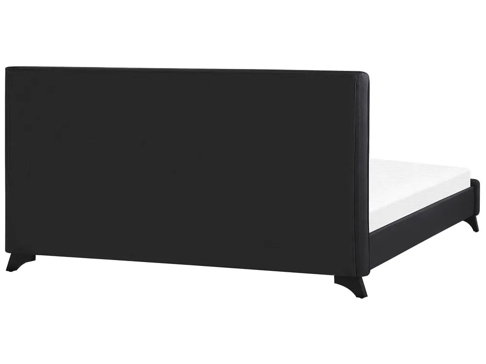 Minimalist black fabric bed with button tufting