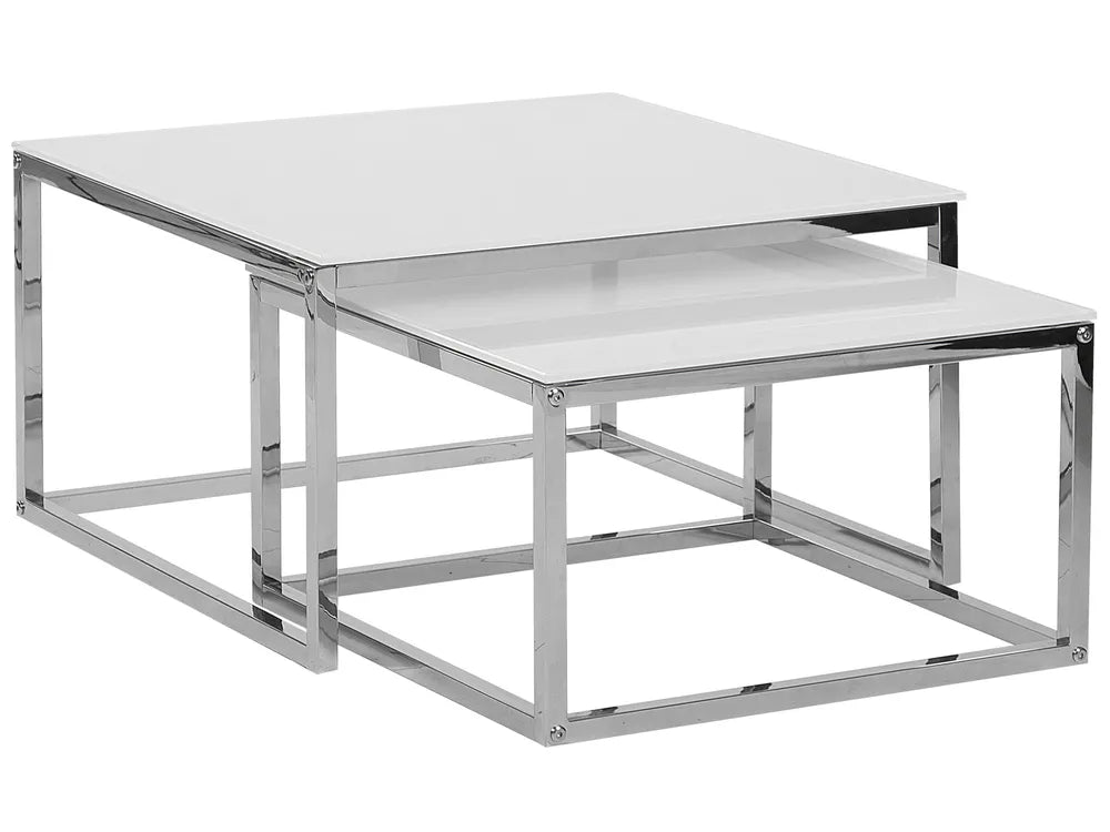Modern coffee table with glass top and metal frame on a white background