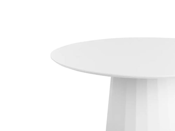 Close-up of a white round table on a white background