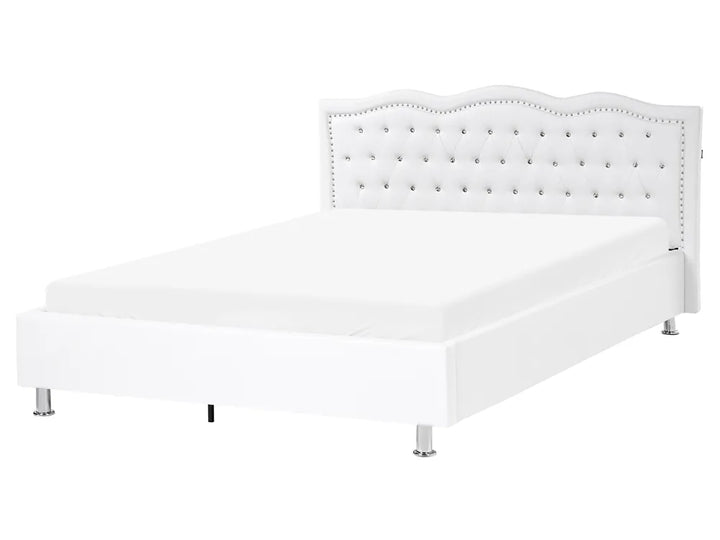White faux leather ottoman bed with tufted headboard