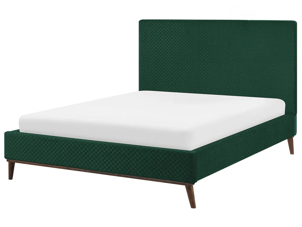 Green bed with white mattress on a white background