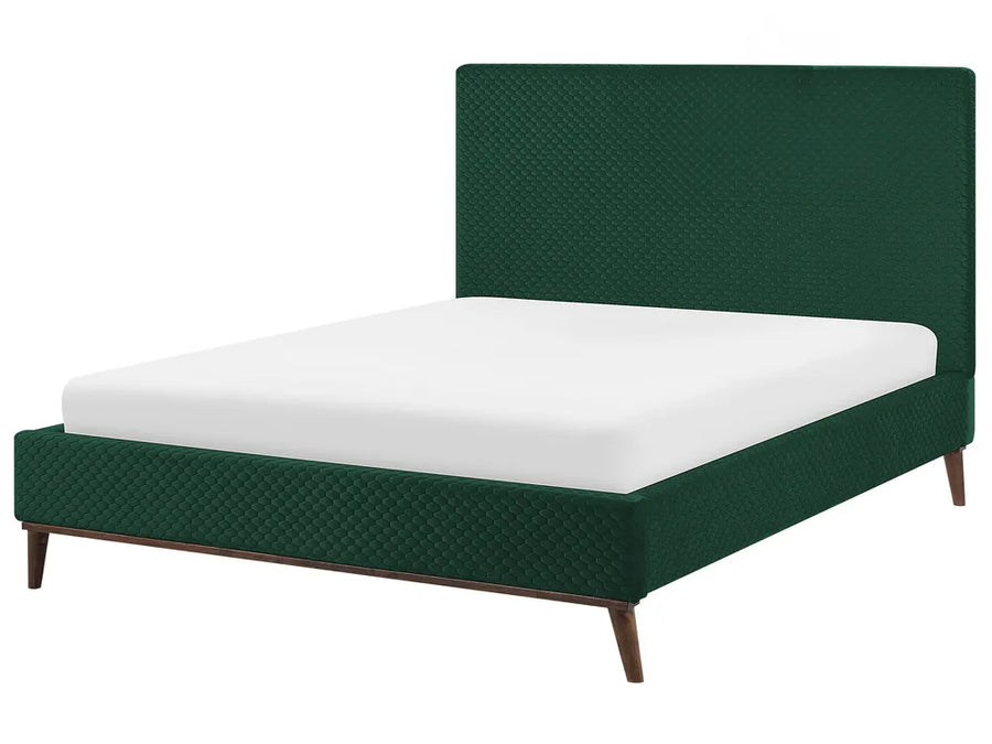 Green bed with white mattress on a white background