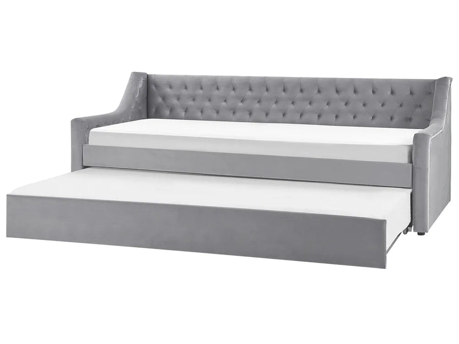 Gray upholstered bed with white mattress on a white background