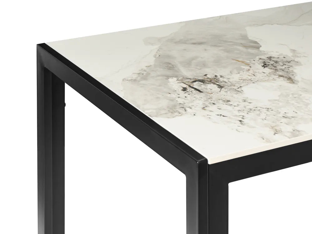 Table with a marble-like top and black metal frame on a white background