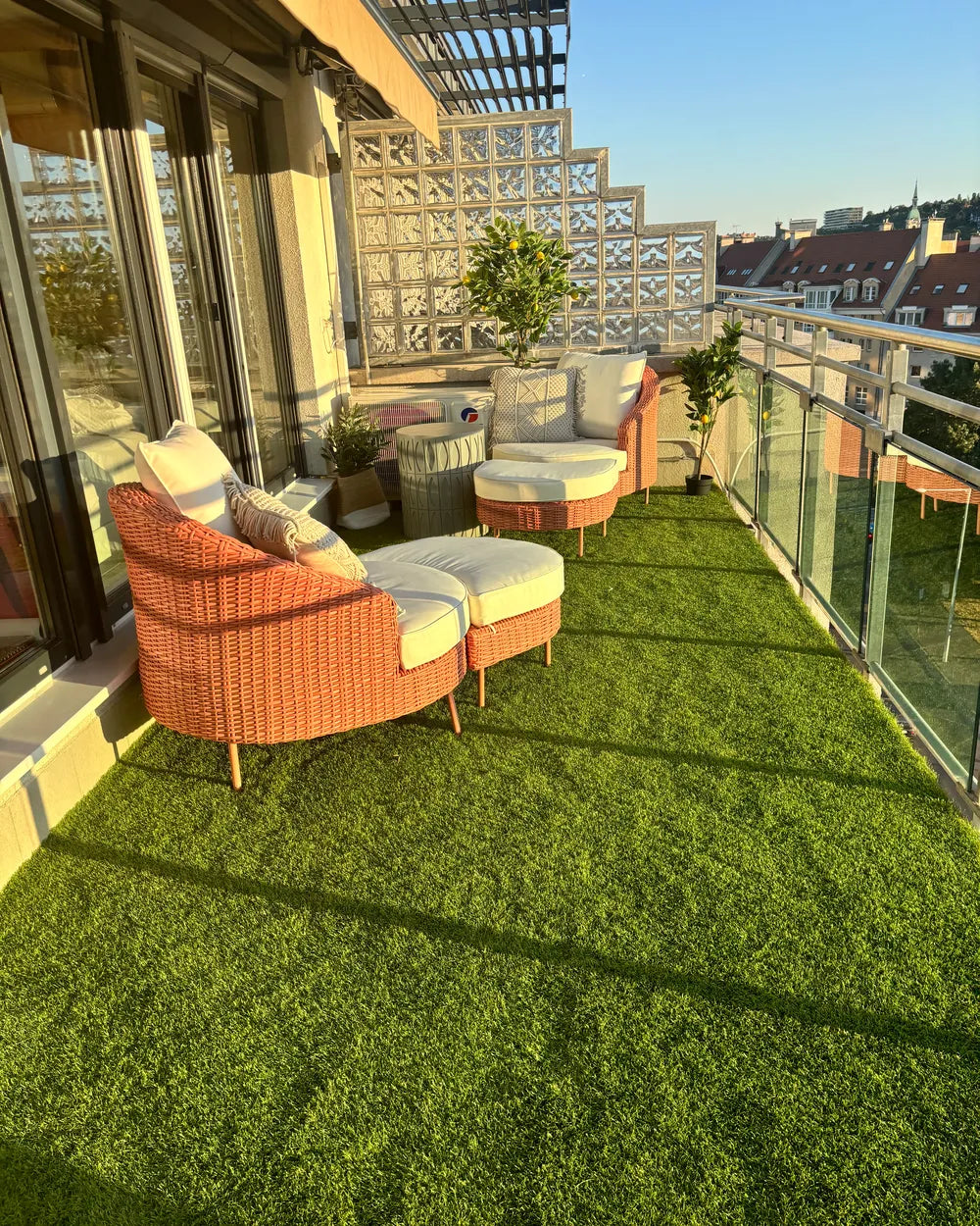 Modern balcony with outdoor furniture and cityscape view